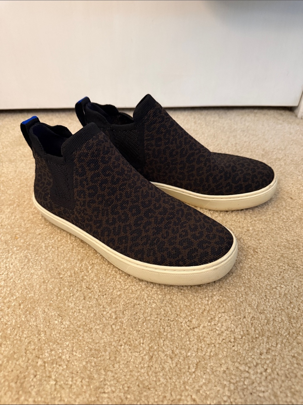 Rothy's Chelsea High Rise slip on in black and Brown Leopard